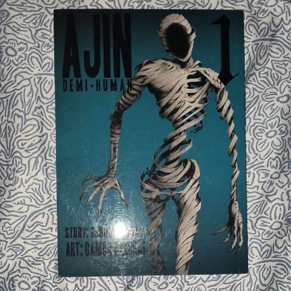 AJIN Demi-Human Volume 1 - Blue Cover